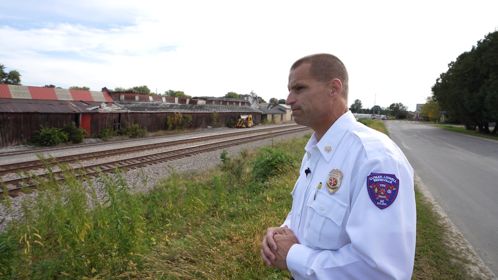 CLR Fire & Rescue Chief Eric Howlett looks out at the tracks near Reeseville, Wisconsin that...