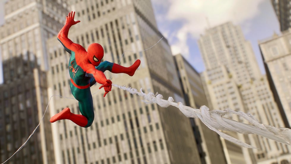 SPIDER-MAN SHOOTS A WEB TO THE RIGHT STRIKING AN ICONIC SPIDEY POSE