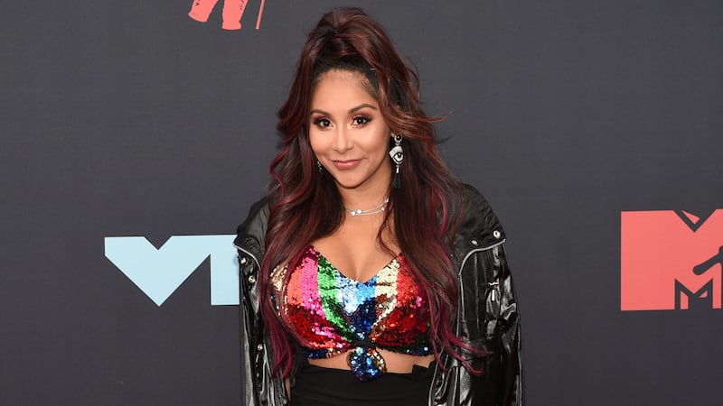 Nicole "Snooki" Polizzi arrives at the MTV Video Music Awards at the Prudential Center on...