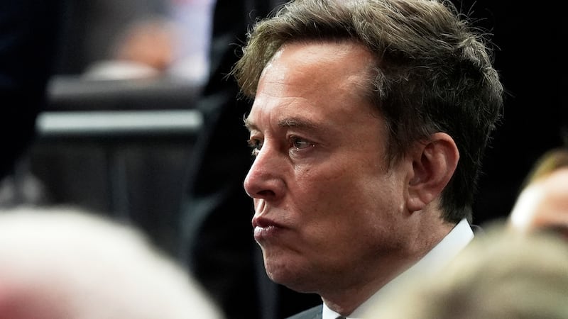 FILE - Elon Musk attends a memorial for conservative activist Charlie Kirk, Sunday, Sept. 21,...