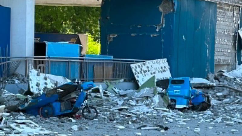 This shows vehicles damaged by debris after powerful earthquake in the Mindanao region,...