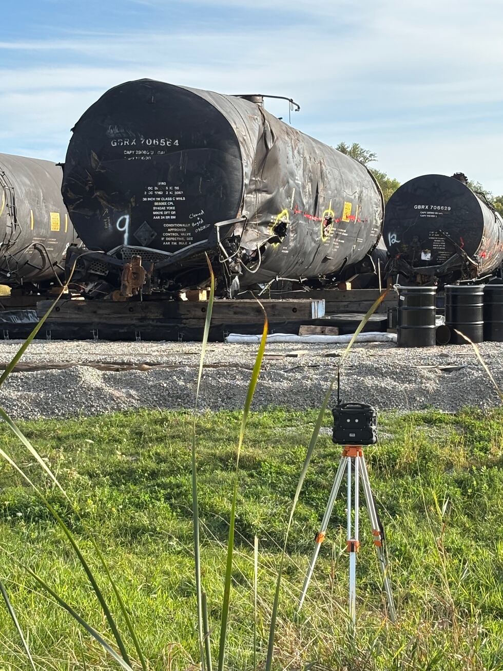 A tanker damaged in an August derailment in Reeseville, Wisconsin, sits lined up with other...