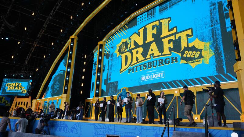 People rehearse ahead of the NFL football draft, Wednesday, April 22, 2026, in Pittsburgh. (AP...