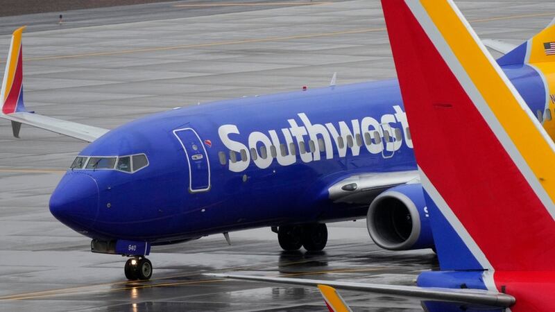 FILE - A Southwest Airlines jet arrives at Sky Harbor International Airport in Phoenix on Dec....