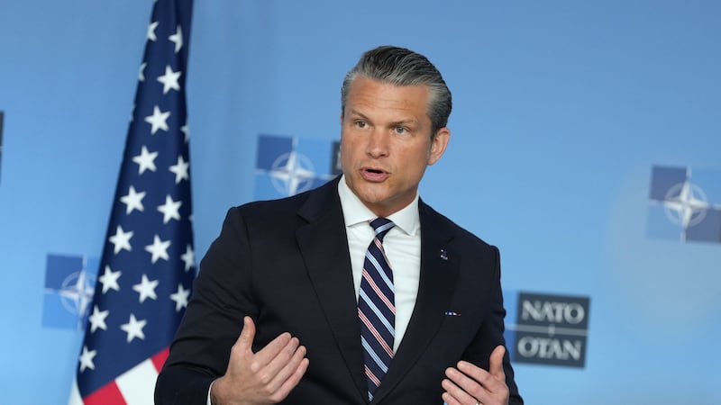 United States Defense Secretary Pete Hegseth speaks during a press statement on arrival for a...