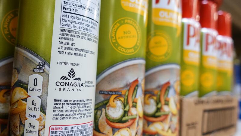 FILE - Cooking spray oils by Pam, a Conagra brand, rest on a supermarket shelf, June 25, 2019,...