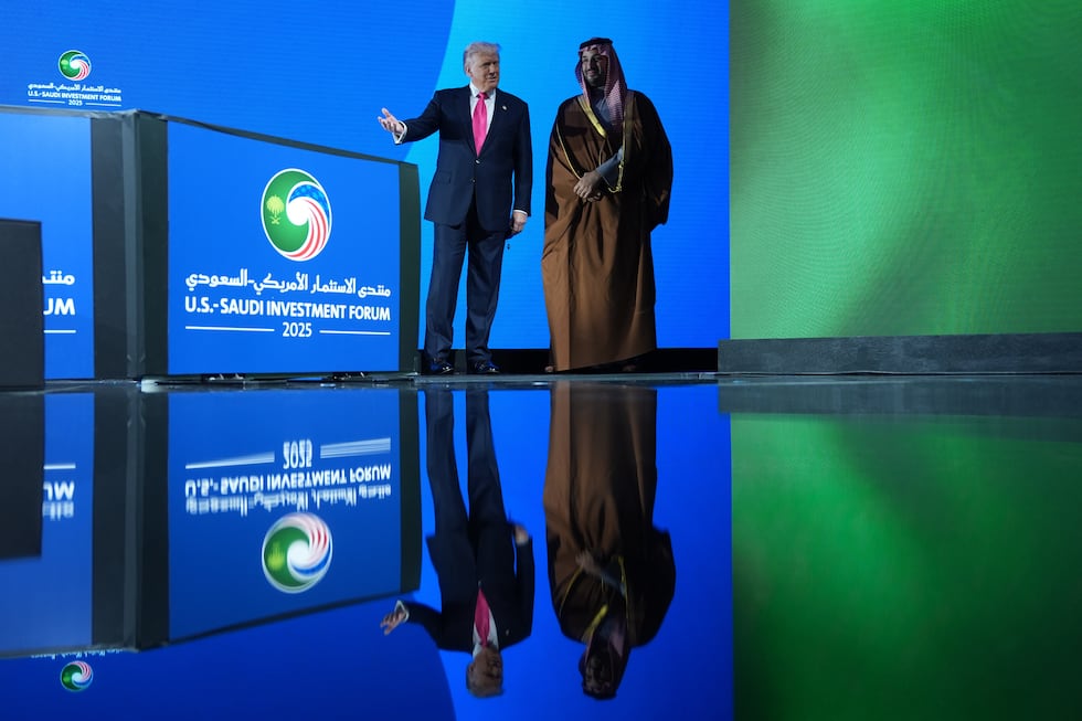 President Donald Trump walks on stage during the Saudi Investment Forum with Saudi Arabia's...