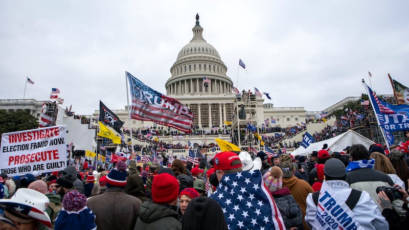 FILE - Rioters loyal to President Donald Trump rally at the U.S. Capitol in Washington on Jan....