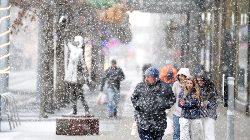 Heavy snow falls along Nicollet Mall Sunday Dec.28, 2025 in Minneapolis.