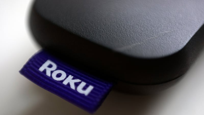 FILE - This Aug. 13, 2020 file photo shows a logo for Roku on a remote control in Portland,...