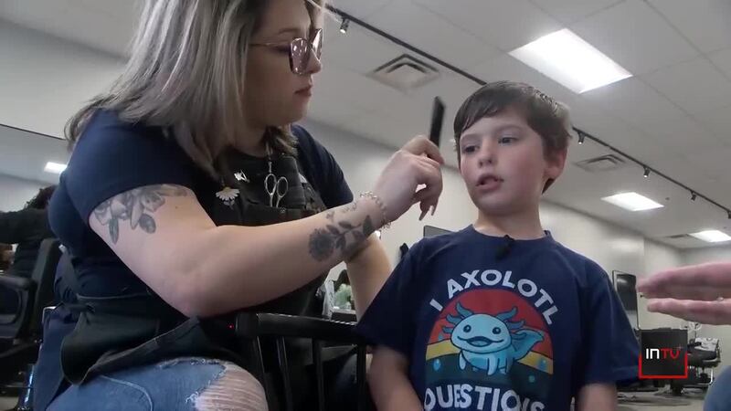 Barber uses unique skill set to give a child on the autism spectrum his first haircut