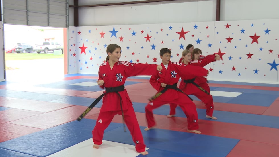 Five students from College Station, known as the "Founding Five," helped paint the interior of...