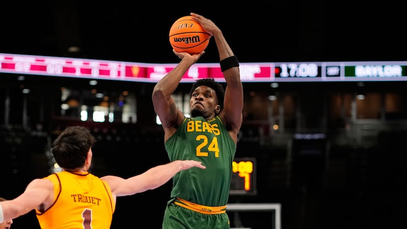 Baylor guard Tounde Yessoufou (24) shoots over Arizona State forward Santiago Trouet (1)...