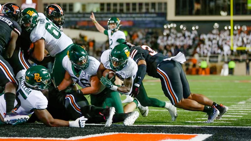Richard Reese scores as the Bears play Texas Tech in Lubbock