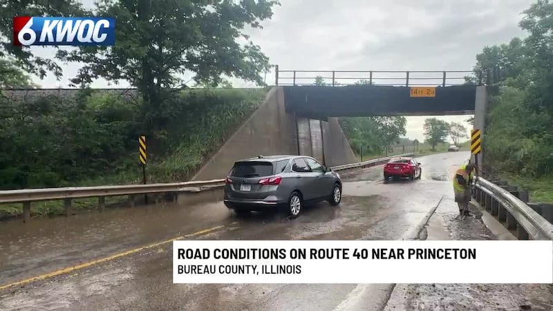 Water can be seen on Route 40 near Princeton, Illinois, Sunday.